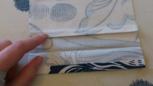 Step 6.5. Sew the fold you made in step 6.3. Press the fold up like in the picture.